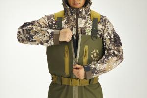 A man zips up the Tidewe Slough Dawgs wader