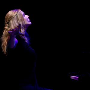 Fiona arms extended for mystical feeling