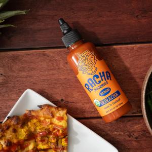 Racha, Certified Organic Hot Sauce makes real food better.