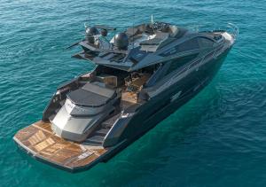 Luxury yacht docked at Dubai Marina with spacious deck and modern design, perfect for private charters and exclusive experiences.