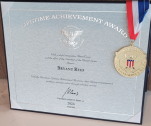 “President’s Lifetime Achievement Award and Kentucky Colonel Commission presented to Bryant Reid in 2025.”