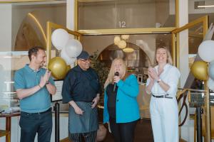 Mayor Holli Thier Presenting the Proclamation to Owner, Betul Kinalilar. Also featuring: Betul's husband, Berk Kinalilar and Executive Chef Membreno