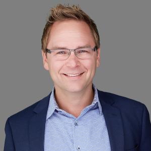 Headshot photo of NAEBA Board Member Justin Gramm