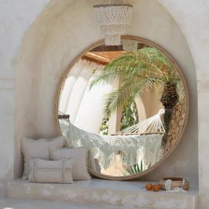 Large wall mirror UAE with modern bedroom interior