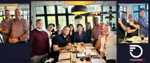 Attractive group of Telecom Sales Reps meet for dinner to discuss Disaster Recovery and Hurricane Preparedness in Florida