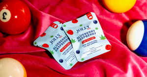 Jolly Cannabis Blueberry Raspberry 1:25 Gummies 2ct Pouch on Pool Table