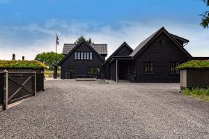 Fremtidens Helårshus: Innovation og Dansk Arkitektur fra 3Huse