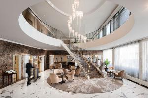 Warwick Geneva Pilots Green Globe for Hospitality Portfolio 10 Warwick Geneva Lobby
