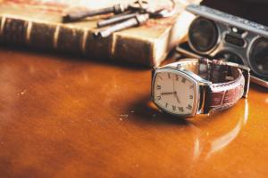 vintage style of luxury men watch with stainless case and leather strap