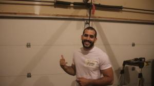 MYA Garage Door Repair, a family-owned and licensed garage door service provider, is excited to announce the expansion of its services across Seattle and neighboring cities, including Bellevue, Everett, Tacoma, Redmond, and Bellingham Jacob Walsh, owner of MYA Garage Door, inspecting a broken garage door spring in Seattle, WA