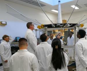 Naval Postgraduate School students examine FLTSATCOM from top to bottom for its last telemetry exercise on Aug. 28, 2025.