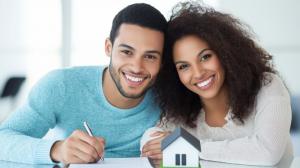 couple signing a pre nup