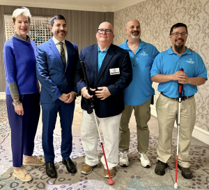 Group photo of two researchers standing with CRF leadership: H. Eric Hartman, Director of Advocacy; Cory MacDonald, Engagement Director; and Jason McKinney, MBA, Board of Directors.