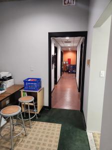 Hallway view at Salt and Light Academy, highlighting the space where classrooms are being developed to support seventh and eighth grade students.