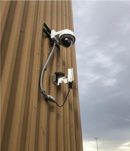 Spotter Global's setup: A Video-AI enabled camera and radar mounted on a wall
