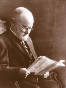 Picture life in the late 1830s in Wild West Wisconsin, before statehood Black and white photo of the founder of the Jones Dairy Farm in a chair