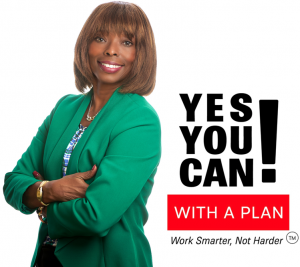 Renowned educator, coach, and health activist Dr Cynthia Simon standing in a green jacket, with her Trademark of “Yes You Can! With a Plan.”