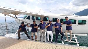 Santai team with plane