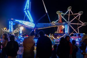 After dark image of amusement rides