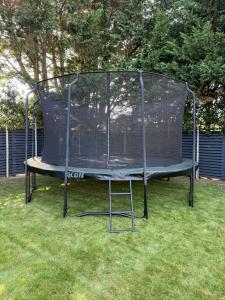 ACON 15ft Round Trampoline in a customer's garden