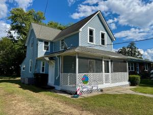 4 BR/2 BA home on .16 +/- acre town lot in the Town of Colonial Beach, VA--nestled between Monroe Bay &. The Potomac River. The home has one bedroom & one bathroom on the main level, 3 bedrooms & one bathroom on the upper level, and features a kitchen w/breakfast nook