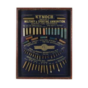 British 1880s-era Kynoch Military & Sporting Ammunition cartridge display board, framed behind glass, the cartridges held onto the backing via bound wire. Estimate: CA$5,500-$6,500.