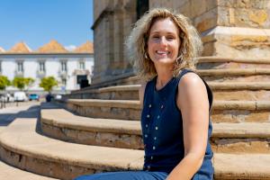 Sarah Hampel traveling in Portugal on a Prosperity Of Life business trip, representing freedom, growth, and international community.