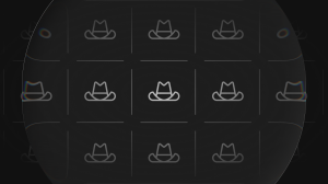 Grid pattern of hats with a magnifying glass over them. The article analyzes the concept of 'wearing multiple hats' and the image hints at that