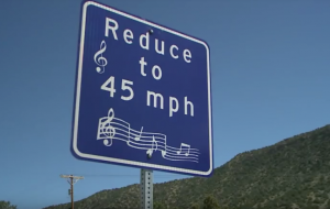 Sign alerting drivers to slow to 45mph to hear a Musical Road play a tune