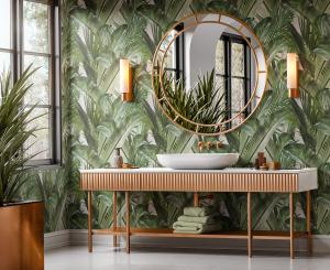 Casamonte, the luxury wallcovering brand known as the art form of texture, proudly announces a new collaboration with internationally acclaimed artist Carlos Betancourt Luxurious bathroom interior featuring Casamonte tropical leaf wallcovering, modern gold-framed mirror, and wood vanity with natural greenery accents.
