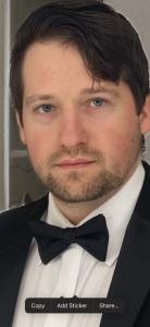 Adam K. Freeland