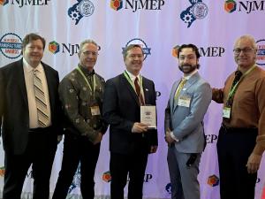 Geared Power receiving 'Leader in Life Sciences' award with NJMEP Director, Marketing and Communications, Mike Womack.