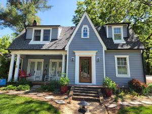 Hatch Homes Receives 2024 James Hardie President’s Club Award for Siding Excellence in Charlotte, NC 14 Blue home exterior remodeled by Hatch Homes with James Hardie® fiber cement siding.