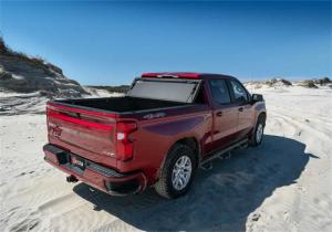 Bonafide Auto Parts today announced the launch of a premium, curated inventory dedicated to Tonneau Covers and integrated truck bed storage systems Red pickup truck with a premium tonneau cover parked on a sandy beach, highlighting truck bed protection and sleek design