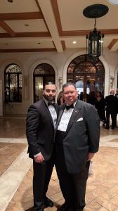 Dr. Amin Halum pictured with Ambassador John Peter Pham, highlighting their collaboration on strengthening U.S., Middle East, and African diplomatic and economic relations.