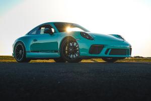 At just 15 years old, Christian Palazzolo is emerging as one of the most exciting young artists to watch in automotive photography teal 911 porsche photo