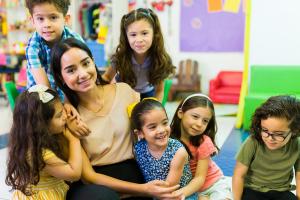 Kids in a room with teacher