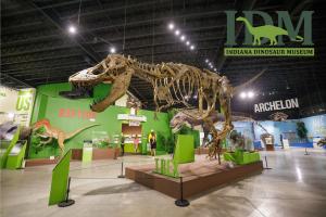 On Saturday, November 15, the Indiana Dinosaur Museum and South Bend Chocolate Company will host Hometown Heroes: A full day celebration honoring service, building community, and supporting Stop 22 Michiana, a nonprofit dedicated to preventing veteran suicide and strengthening local support Picture of a t-rex  inside of Indiana Dinosaur Museum