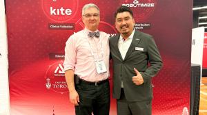 Professor Milos R. Popovic and Even Koh in discussion at RehabWeek 2025