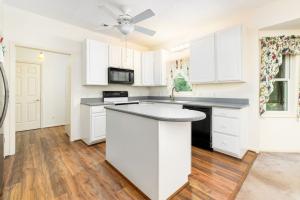 3 BR/2.5 BA brick ranch-style home on .87± acre Lake Gaston waterfront lot in the desirable Timbuctu Subdivision with a shared dock, attached 2 car garage and located in a quiet cove only 740'± from the main channel