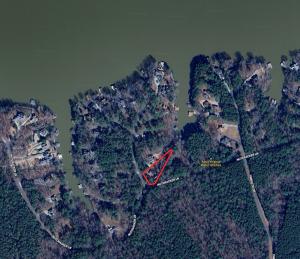 3 BR/2.5 BA brick ranch-style home on .87± acre Lake Gaston waterfront lot in the desirable Timbuctu Subdivision with a shared dock, attached 2 car garage and located in a quiet cove only 740'± from the main channel
