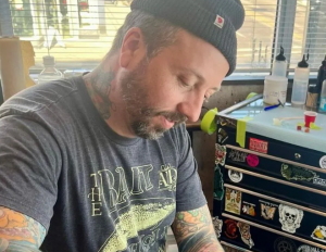 black-and-grey mountain -tattoo