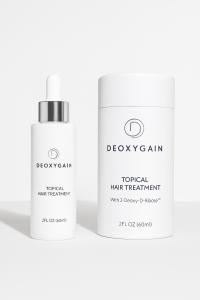 Deoxygain hair regrowth serum bottle and packaging