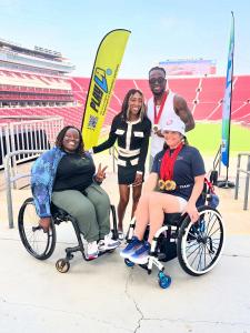 Ella Bee Media Group Expands Services to Offer Athlete Marketing and Procurement for Businesses and Government Agencies 15 Lila Brown with Paralympians