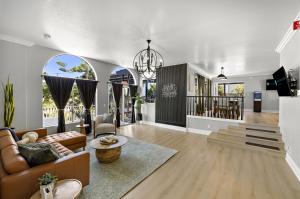 Bright, modern lounge at Alter Behavioral Health Women’s Center in Dana Point featuring natural light, soft seating, and a calming environment for healing.