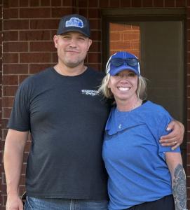 Tom and Joy Meadows Owners of Neighborhood Roofing smiling