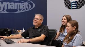 Scott Monnin with his daughters in office.