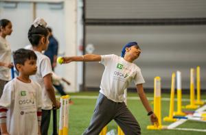 A young participant bowls during OSCA’s Brampton Recreational Cricket Program at Save Max Sports Centre, promoting inclusion, confidence, and active living through cricket with support from TD Bank and Rogers Communications.