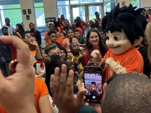 Goulds Elementary students look on as Rollie shares business tips