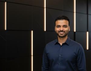 A Picture of Graham Miranda with a Black wall background